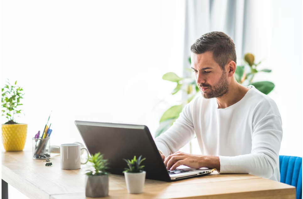 man working on laptop